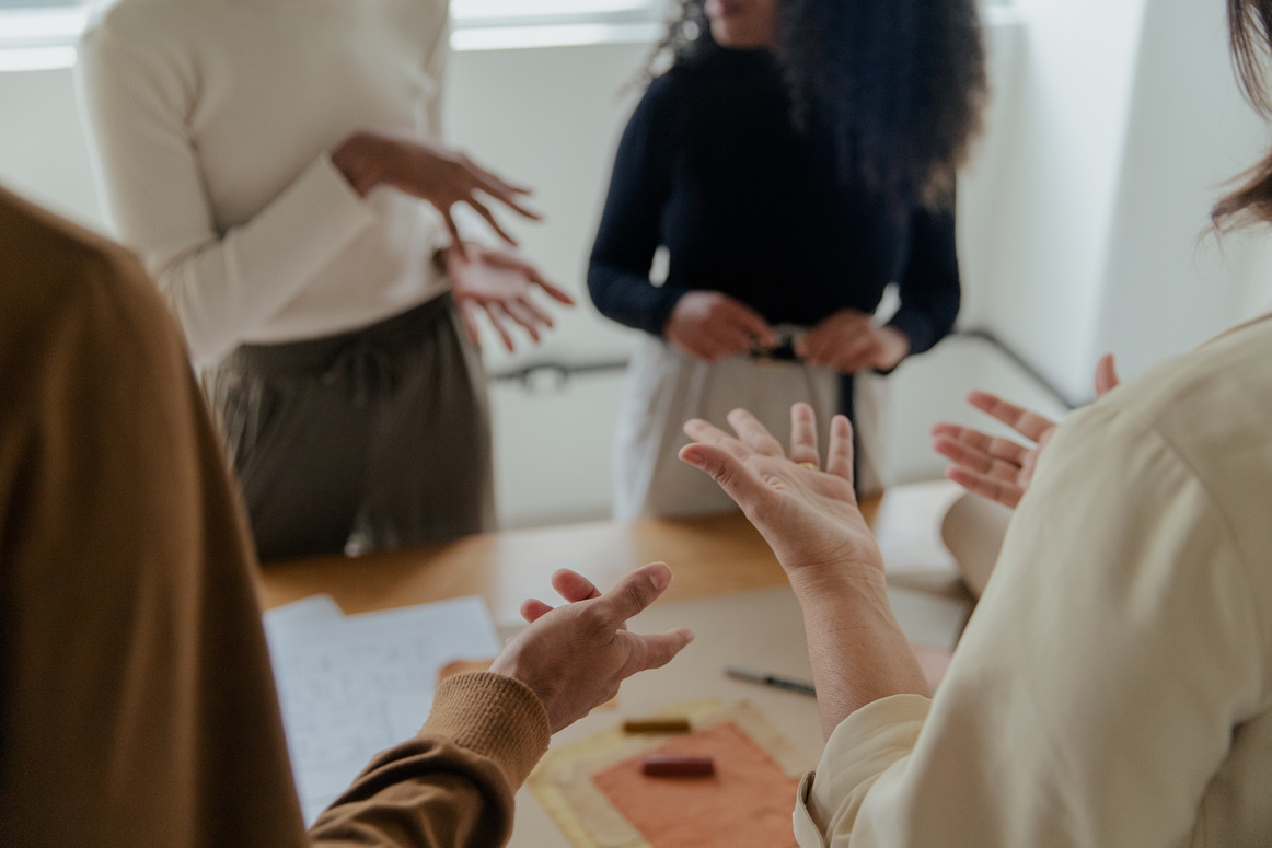 Team of Business People Collaborating Ideas in a Meeting